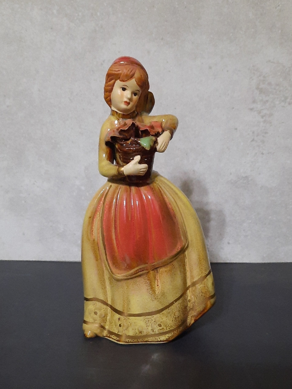 Vintage Girl Figurine in Red and Yellow Dress With Basket Of Flowers